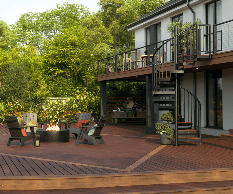 Trex Spiral Stairs Summit with a black frame beside a fire-pit lounge